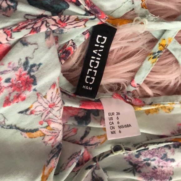 teal flowered romper - Picture 2 of 3